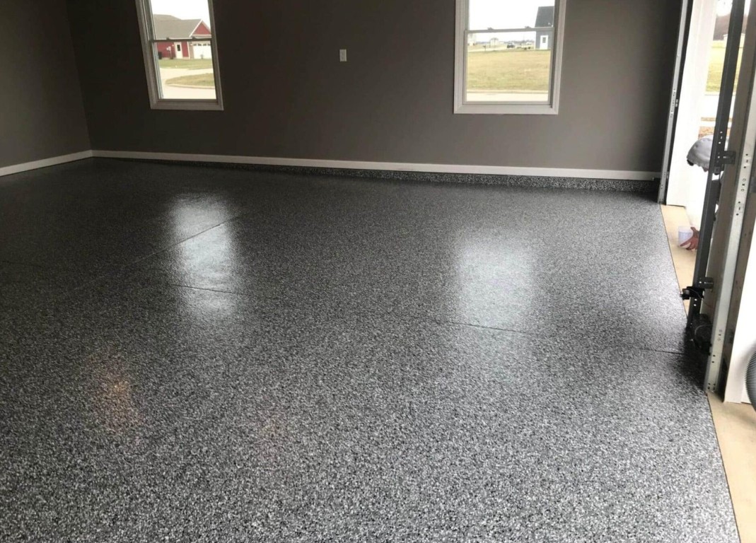 Professional epoxy garage floor coating installation in Jensen Beach, FL